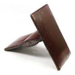 A close nailed burgundy leather upholstered gout stool, a late 19th/early 20th century,