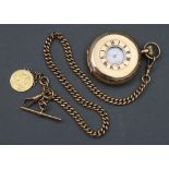 A 9ct curb link watch chain, with 'T' bar and two swivel seals, 58g, a George V sovereign 1927,