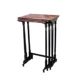 A nest of three late Regency rosewood tables, the rectangular boxwood strung tops,