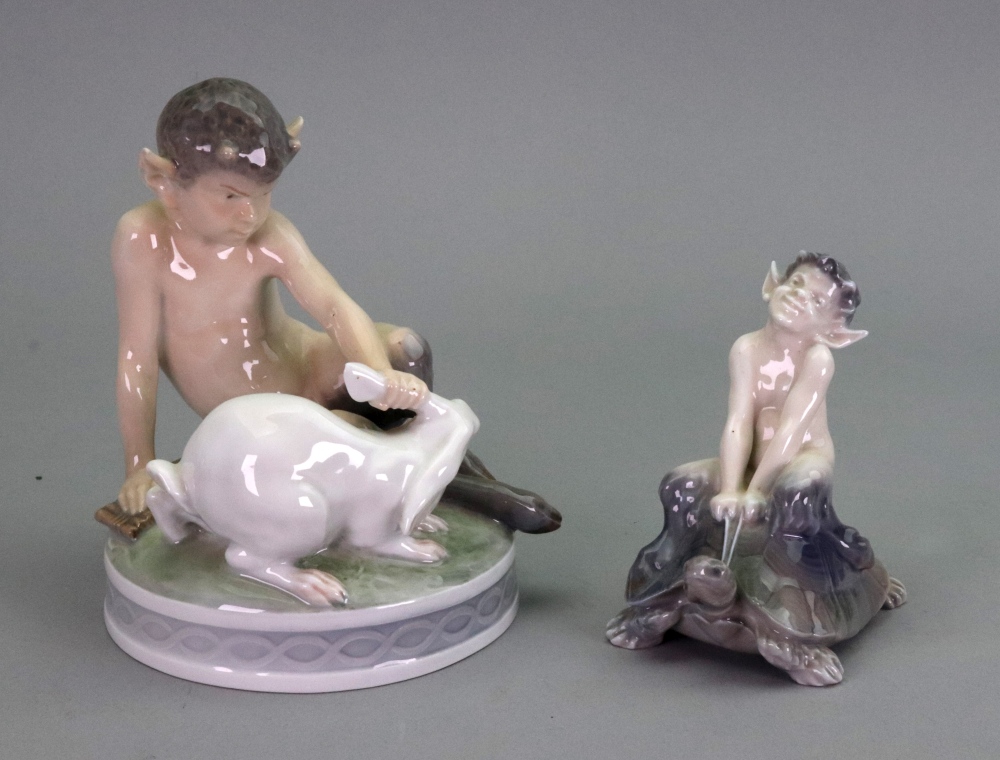 A Royal Copenhagen figure faun with rabbit 439, 14cm high and faun on turtle 858, 10cm high (2).