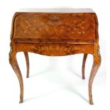 A Louis XV style kingwood crossbanded and floral marquetry gilt metal mounted bureau de dame,