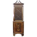 An Edwardian mahogany satinwood crossbanded boxwood and ebony strung floor standing corner cabinet,