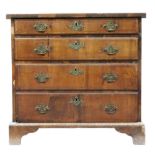 A mid 18th century walnut cross and feather banded chest,