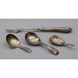 A George III silver bright cut engraved shell bowl caddy spoon, George Wintle, London 1809,