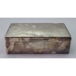 A rectangular silver cigar box, Richard Comyns, London 1946, with engine turned hinged cover,