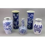 A pair of Chinese blue and white sleeve vases, late 19th century,