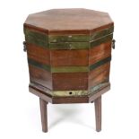 A George III style mahogany brass bound octagonal wine cooler, 19th century, with hinged top,