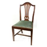 A set of eight reproduction Hepplewhite style mahogany dining chairs,