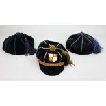 A vintage black velvet Sherborne School cap, with gold braid and tassel, with school crest,