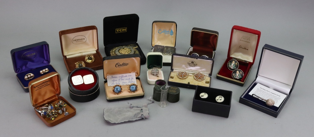 A collection of costume jewellery, comprising twelve pairs of dress cufflinks,