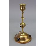 A Victorian brass candlestick, circa 1860,