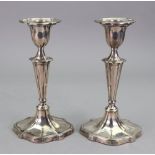 A pair of George III style silver candlesticks, Hawksworth Eyre, Sheffield 1898,