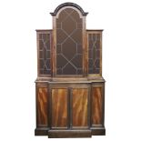 A George III style mahogany breakfront library bookcase, circa 1900,