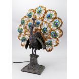 A bronzed gilt metal and glass peacock lamp, circa 1920's,