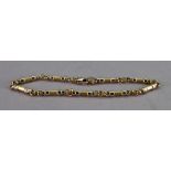 A gold barrel link bracelet, with lobster clasp, detailed 750, length approximately 20.5cm, 14.