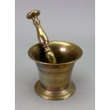 A brass pestle and mortar, 19th century, the mortar stamped 'Turner & Co' twice, 11cm diameter (2).