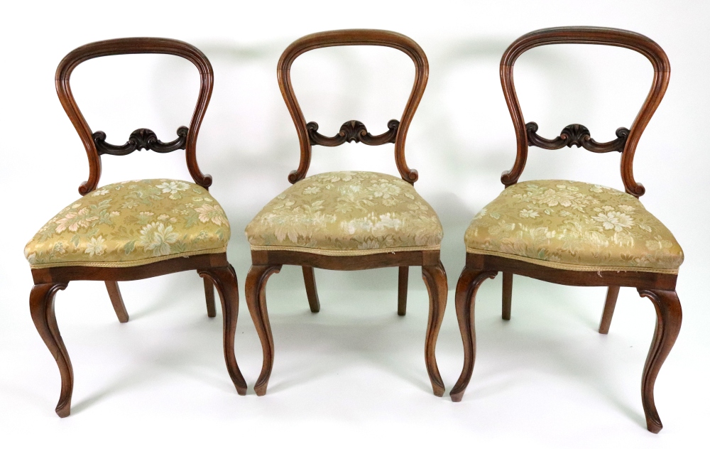 A set of six Victorian rosewood balloon back dining chairs, circa 1860,