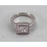 A platinum and diamond square cluster ring,