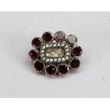 A gemset and seed pearl mourning brooch,