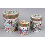 Three Canton famille rose cylindrical jars and covers, 19th Century,