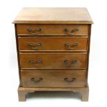 A reproduction George III style mahogany chest, the moulded rectangular top above four drawers,