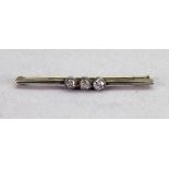 A diamond bar brooch, the three old cut diamonds millegrain set to the centre of the knife wire, 3.