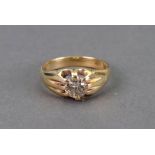 A gold and diamond single stone ring,