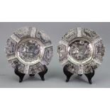 A near pair of ornate Dutch silver cigar ashtrays, early 20th century,