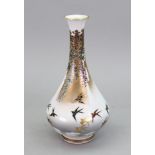 A Japanese kutani vase, Meiji period, of slender bottle form,