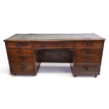 An early Victorian mahogany kneehole desk,