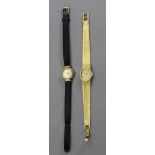 Omega; a lady's gold plated and stainless steel wristwatch,