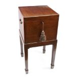 A George III style mahogany satinwood banded cellarette, 19th century, with moulded hinged top,