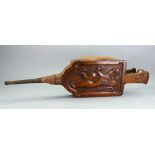 A large pair of Art Nouveau oak bellows, carved with a lion, 80cm long.