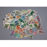 A small selection of Revenue stamps with USA, Ceylon, Great Britain and Europe etc.