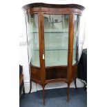 An Edwardian mahogany boxwood strung vitrine, of demi lune shape with concave front,