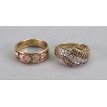 A gold and diamond ring, the central wave shaped panel pave set with round brilliant cut diamonds,