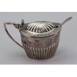 A George III style oval tapering silver mustard pot, Goodfellow & Sons, London 1908,