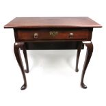 A mid 18th century mahogany side table, the rectangular top with a hinged drop leaf, frieze drawer,