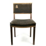 An Elizabeth II limed oak Coronation chair, the back and seat upholstered in velvet, numbered '6'.