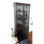 An early Victorian mahogany bookcase, of narrow proportions,