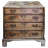 An early 18th century walnut and crossbanded chest,