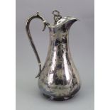 A Victorian tall pear shape electroplate wine flagon, engraved with fruiting vines, 28cm high,