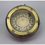 Davey & Co (London) Ltd, a brass cased compass in gimble mount, 18.5cm diameter.