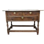 A late 17th century oak lowboy, the moulded rectangular top above two short and one long drawer,