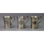 A set of three silver tankards, Birmingham Mint, Birmingham 1977, 1978 & 1981,