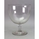 A large George III style glass goblet, on a trumpet shape stem and spreading circular foot, 19.