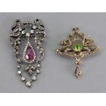 A gold, peridot and seed pearl brooch/pendant, the peridot set in a millegrain setting,