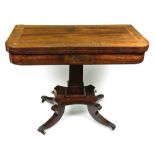 A Regency rosewood and cut-brass card table,