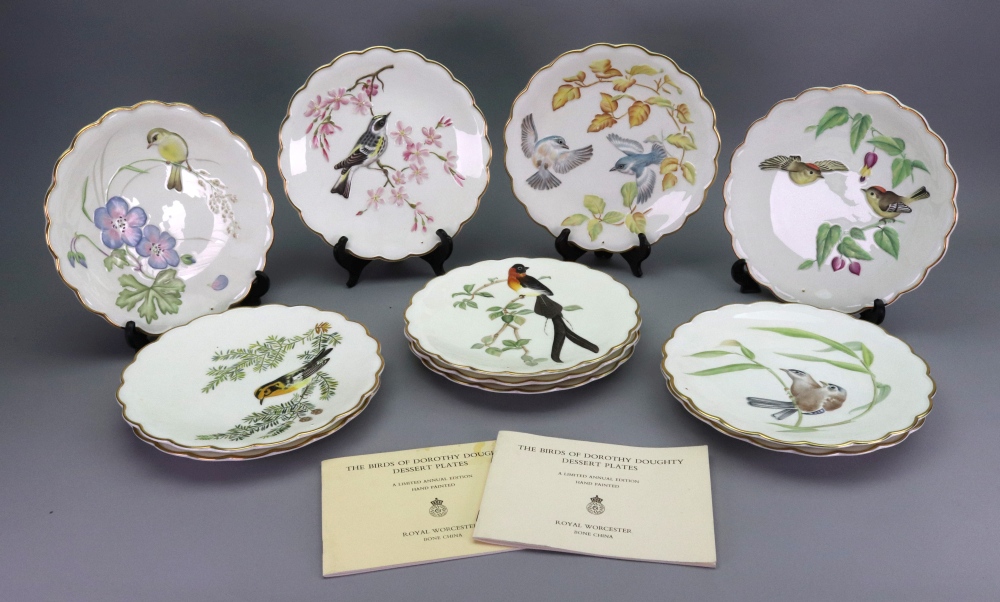 A set of eleven Royal Worcester The Birds of Dorothy Doughty dessert plates,