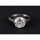A single-stone diamond ring, the brilliant cut stone approximately 1.